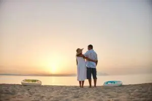 Romantic beach sunset with couple