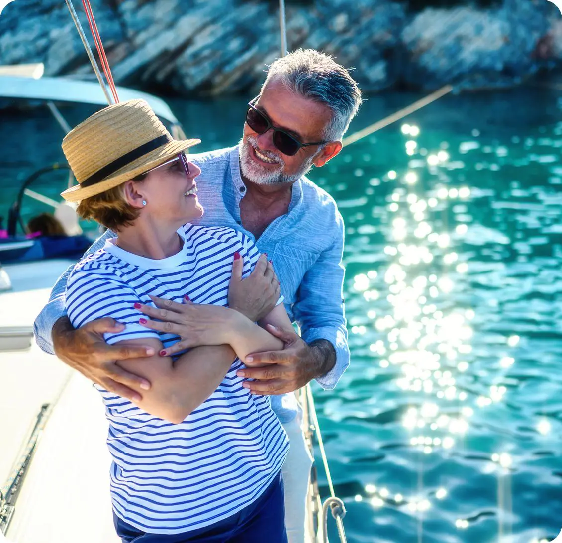 Happy pair enjoying a boat trip