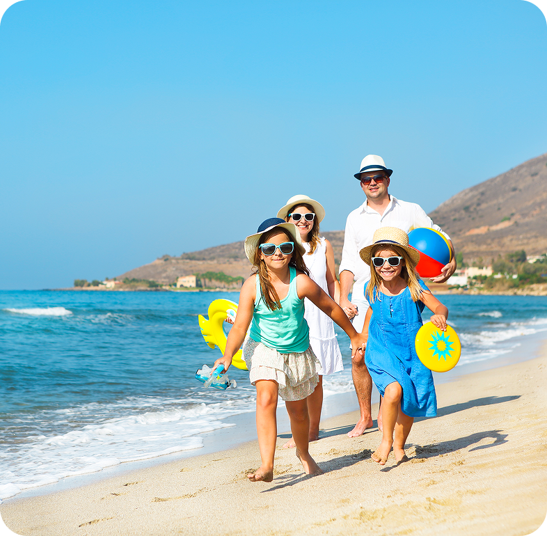 Family enjoying a sunny beach day